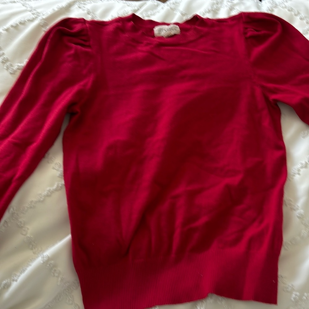 Red sweater top with poof on sleeve